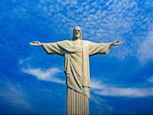 statue of liberty under blue sky during daytime