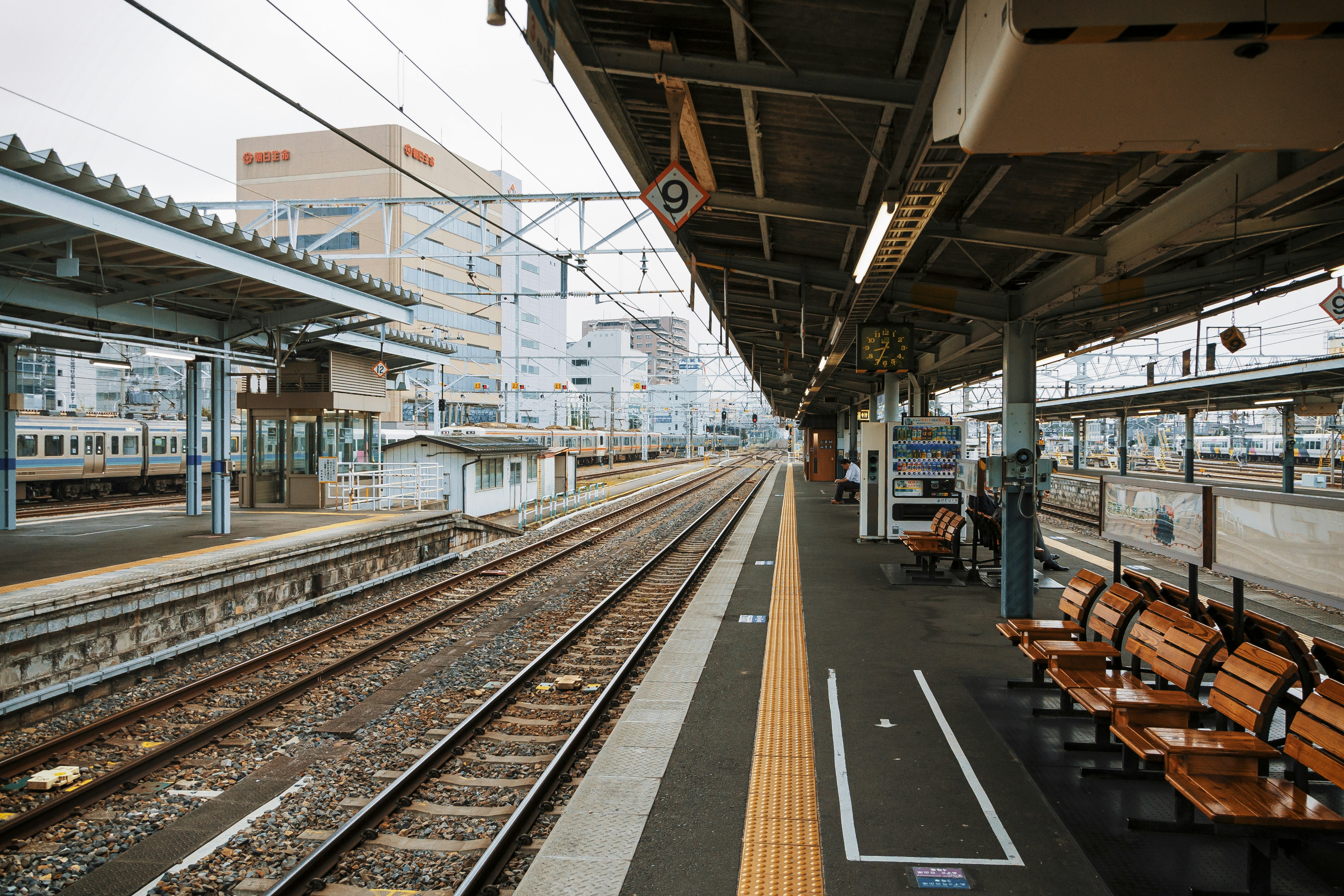 Empty train station platform in Tokyo on a quiet holiday morning