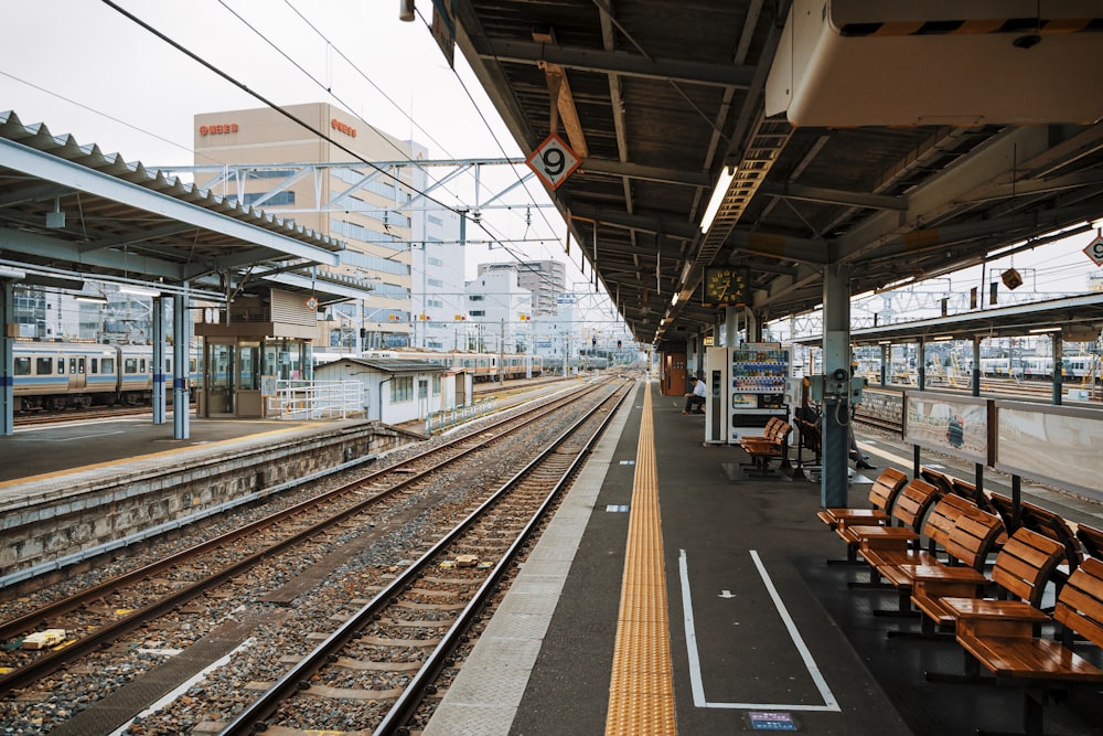 people walking on train station during daytime