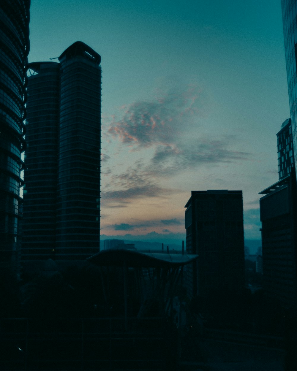 silhouette of buildings during sunset