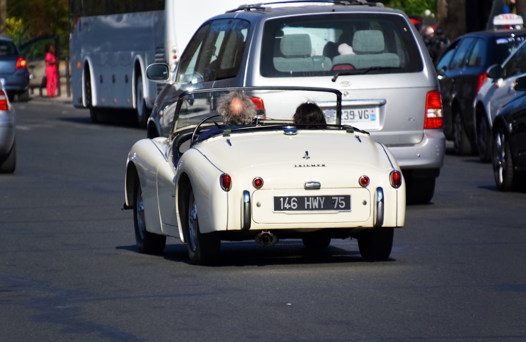 white porsche 911 on road during daytime