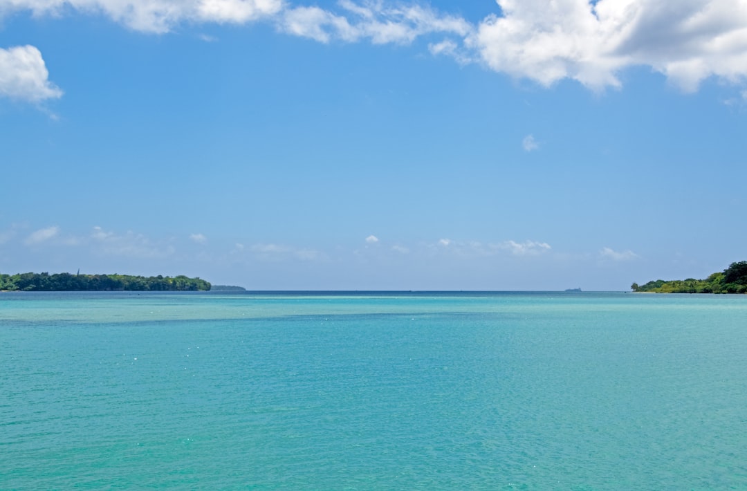 blue sea under blue sky during daytime