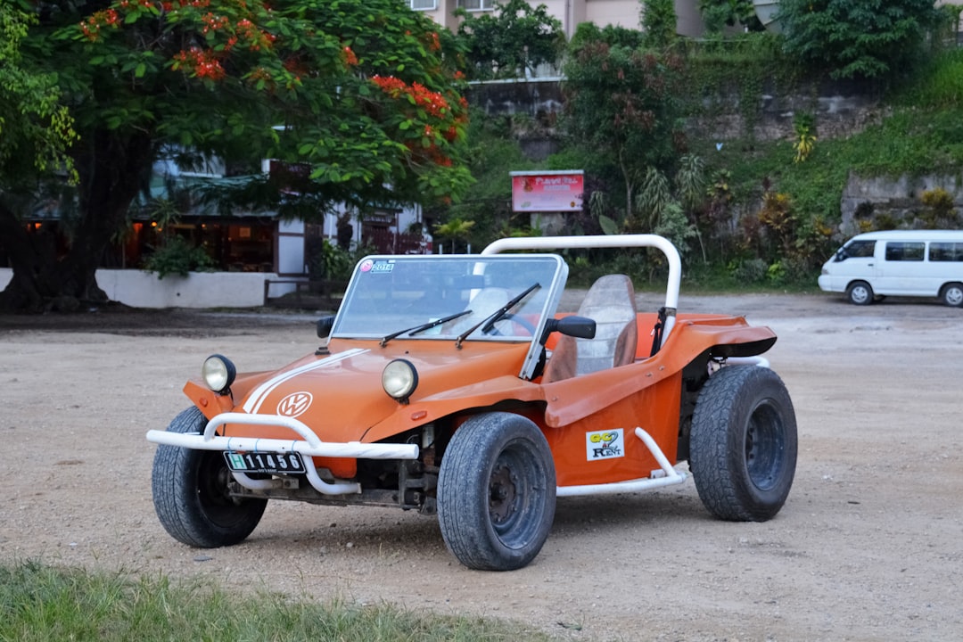 orange and black ride on toy car