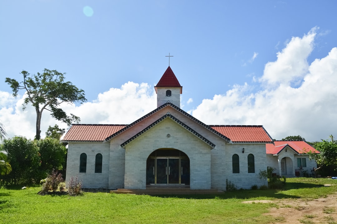 white and brown concrete church