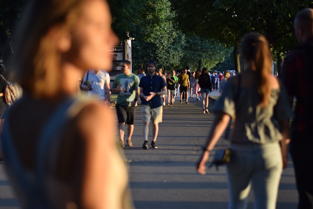 people walking on pedestrian lane during daytime