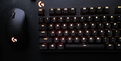 A stylish keyboard and mouse set illuminated with soft lighting.