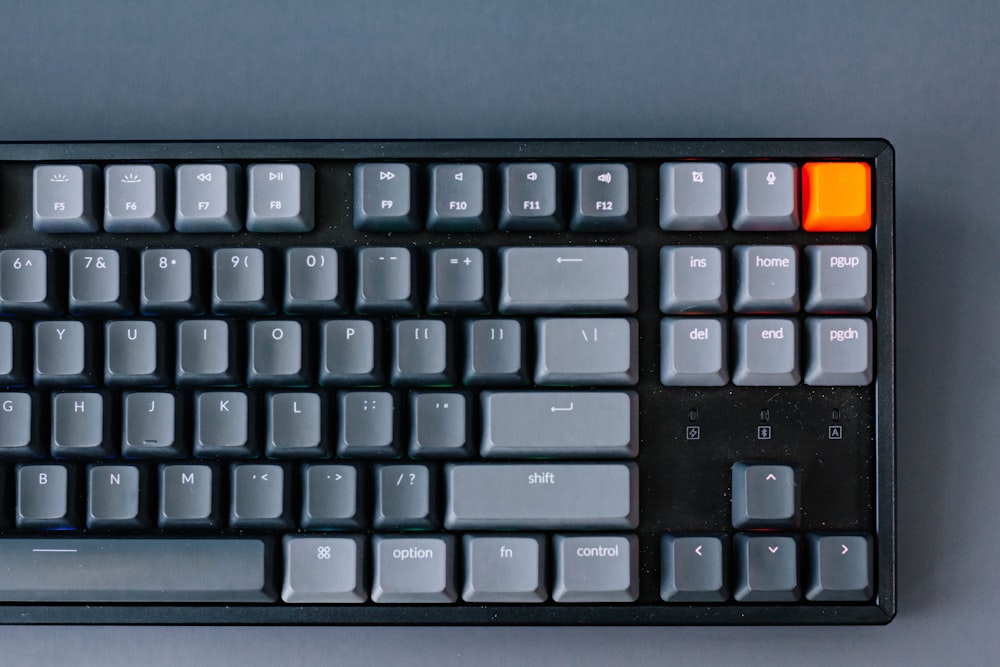 black computer keyboard on white desk