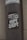A weathered pole displays a monochromatic sticker with bold, stylized text reading 'The Kulture of Hype & Hope'. The surrounding environment suggests an urban setting with a gritty texture.