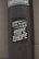 A weathered pole displays a monochromatic sticker with bold, stylized text reading 'The Kulture of Hype & Hope'. The surrounding environment suggests an urban setting with a gritty texture.