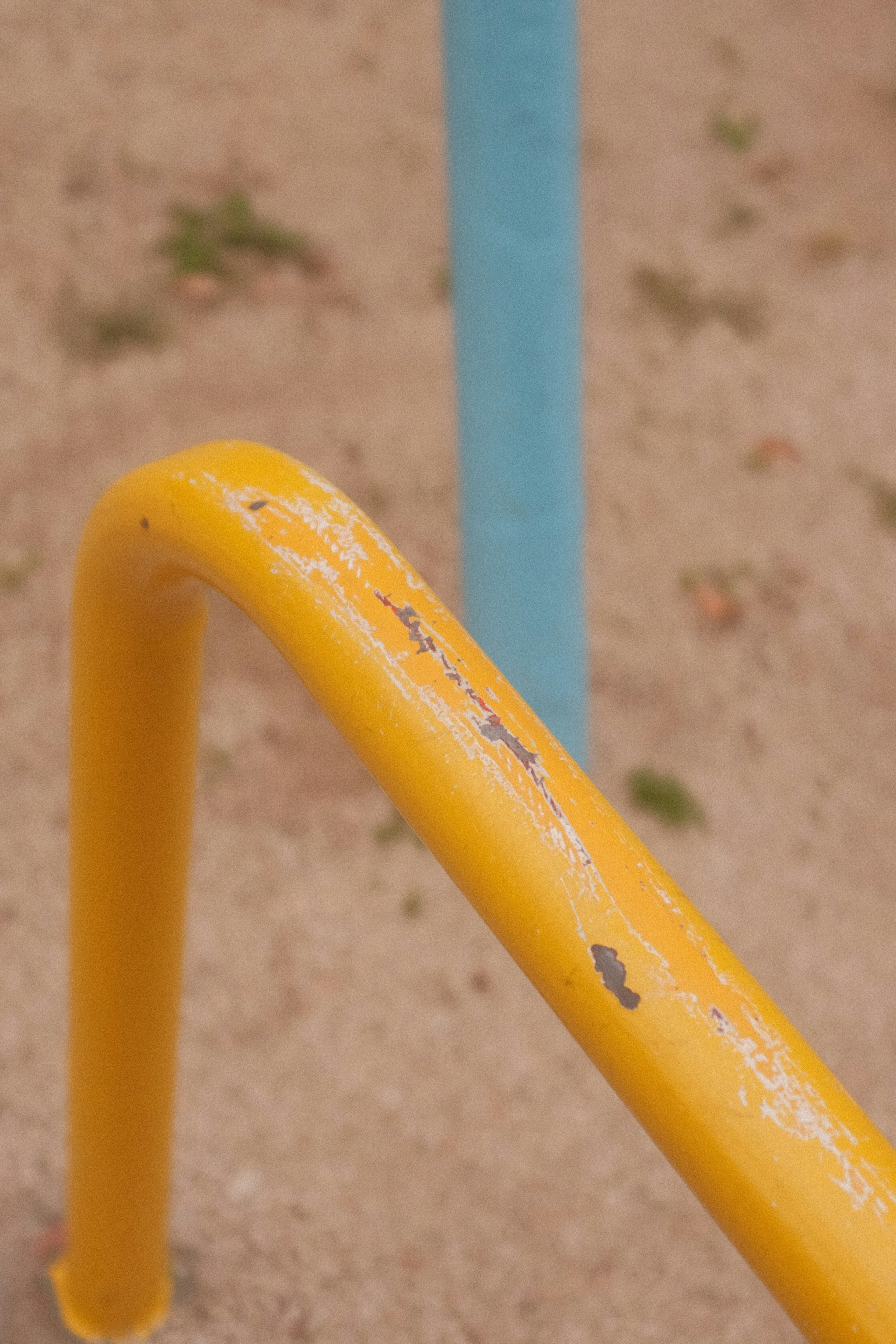 woman wearing yellow long-sleeved dress under white clouds and blue sky during daytime