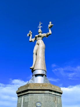 gold statue of a man