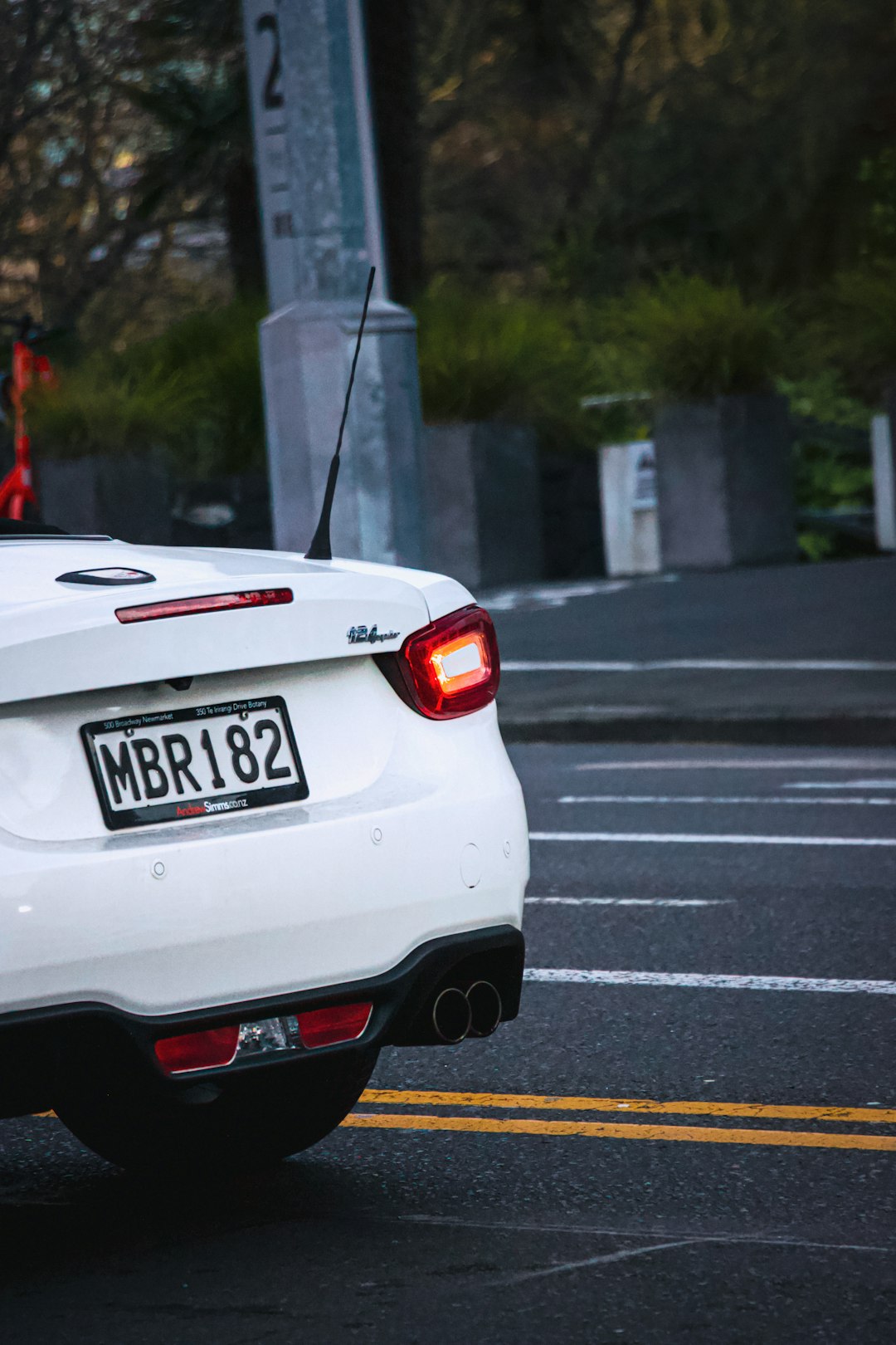 white honda car on road during daytime