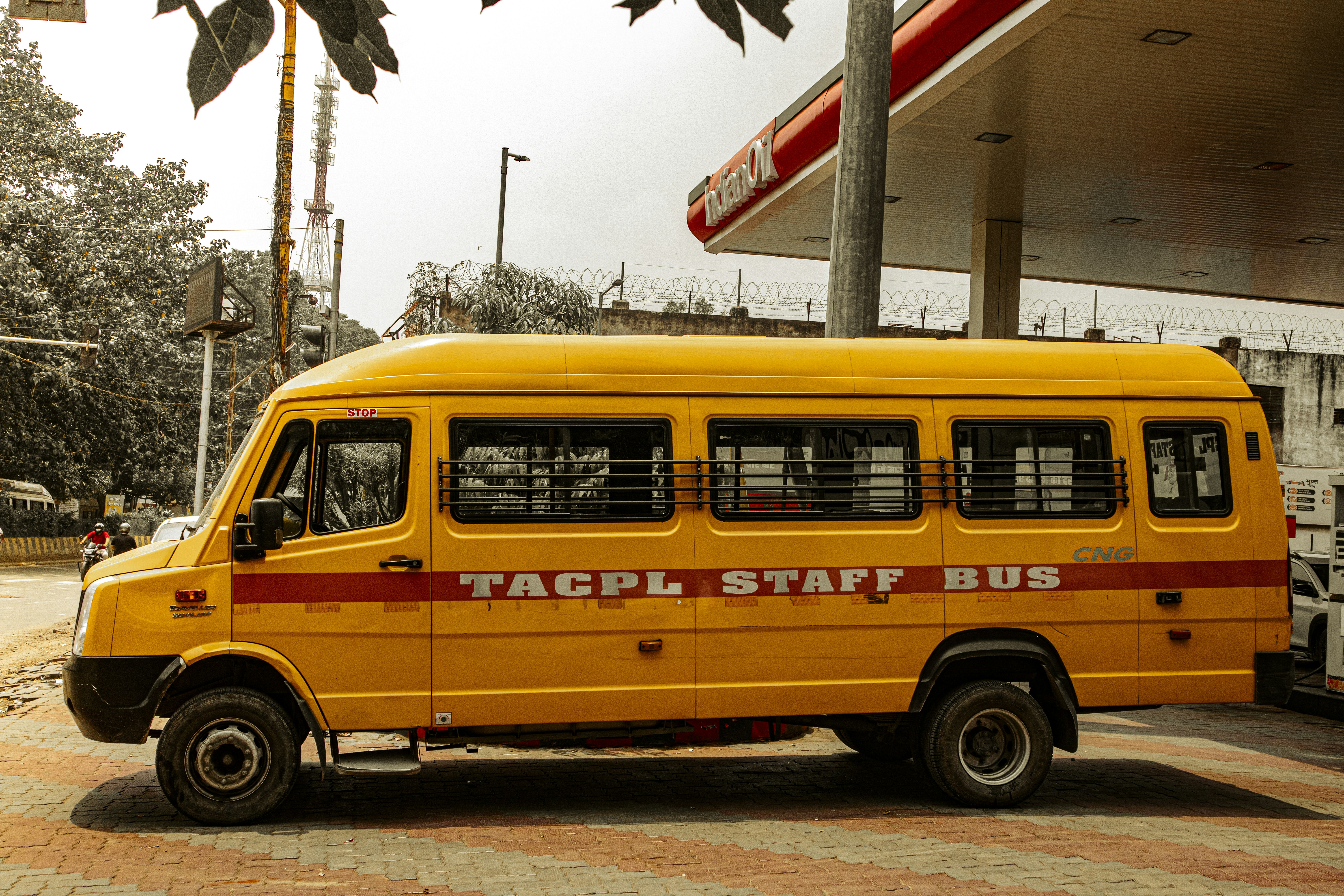 yellow van parked on the side of the road