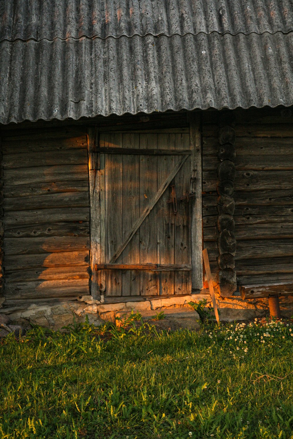 brown wooden door on gray wooden wall