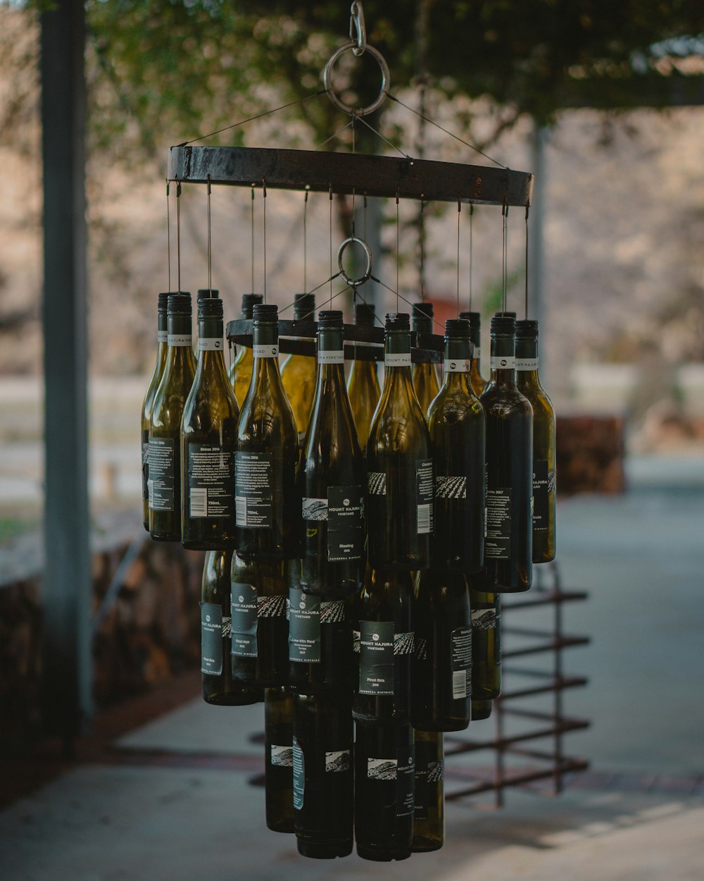 black and gold bottles on black metal rack