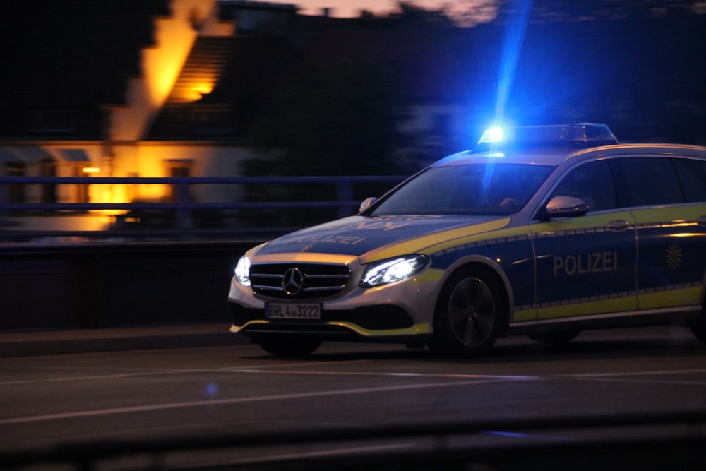 black mercedes benz coupe on road during night time