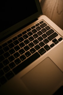 macbook air on black textile
