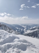 snow covered mountain under blue sky during daytime