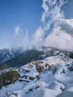 snow covered mountain under blue sky during daytime