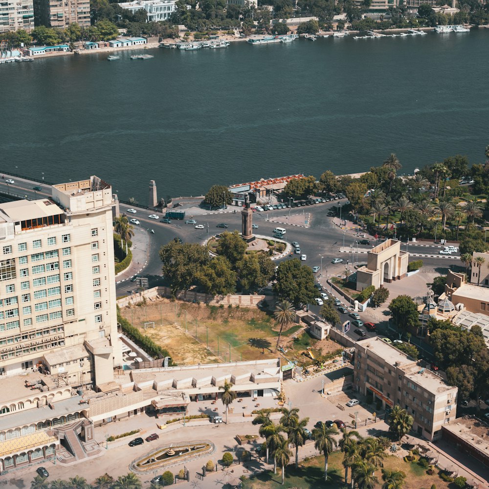 white concrete building near body of water during daytime