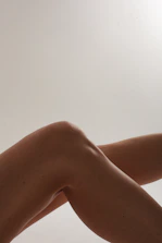 A pair of knee and elbow pads displayed on a clean white background.