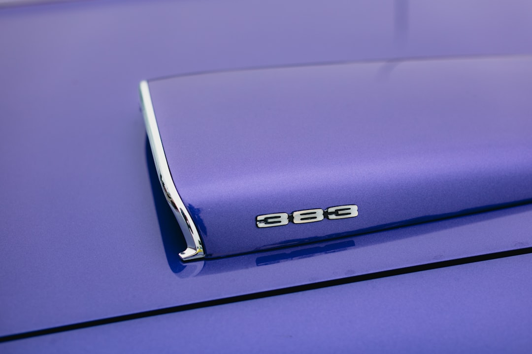 blue mercedes benz car on purple background