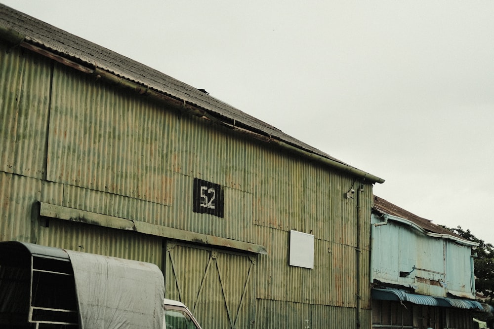 green and brown wooden house