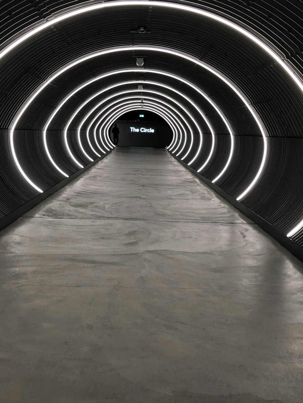 black and white tunnel with no people