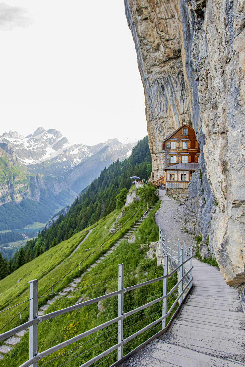 brown wooden house on top of mountain during daytime