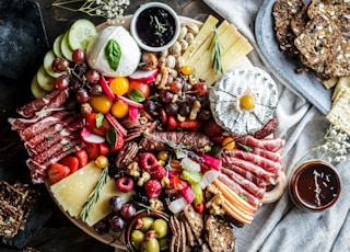 sliced fruits on brown wooden bowl