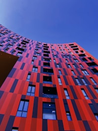 pink and blue building under blue sky