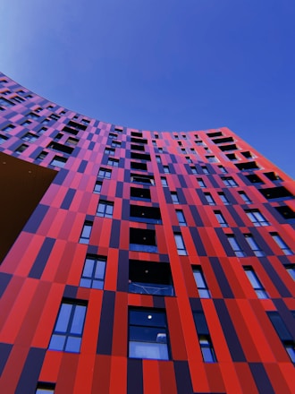 pink and blue building under blue sky