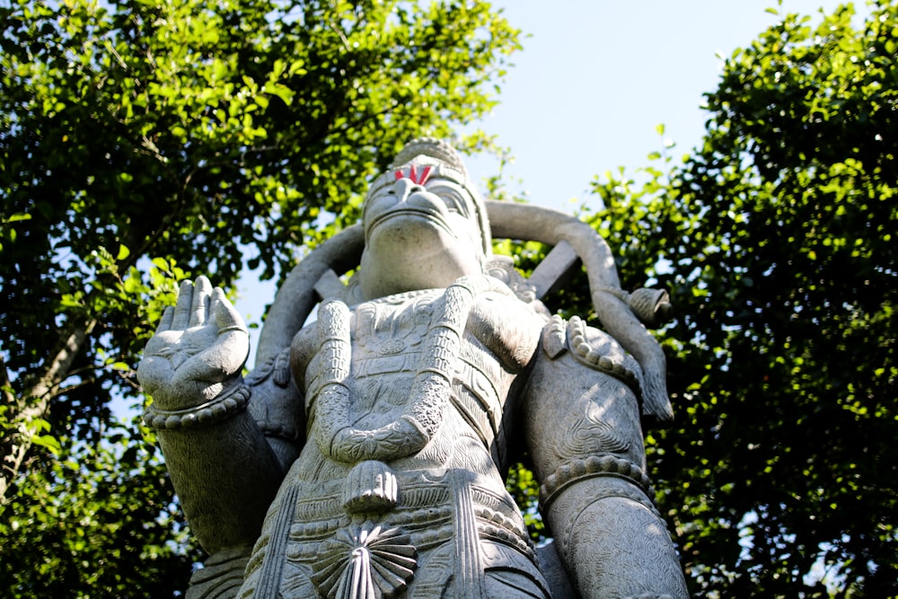 gray concrete statue of woman