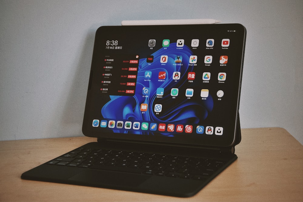 black tablet computer with keyboard