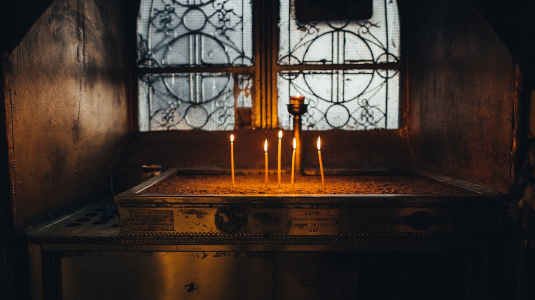 brown wooden table with candles