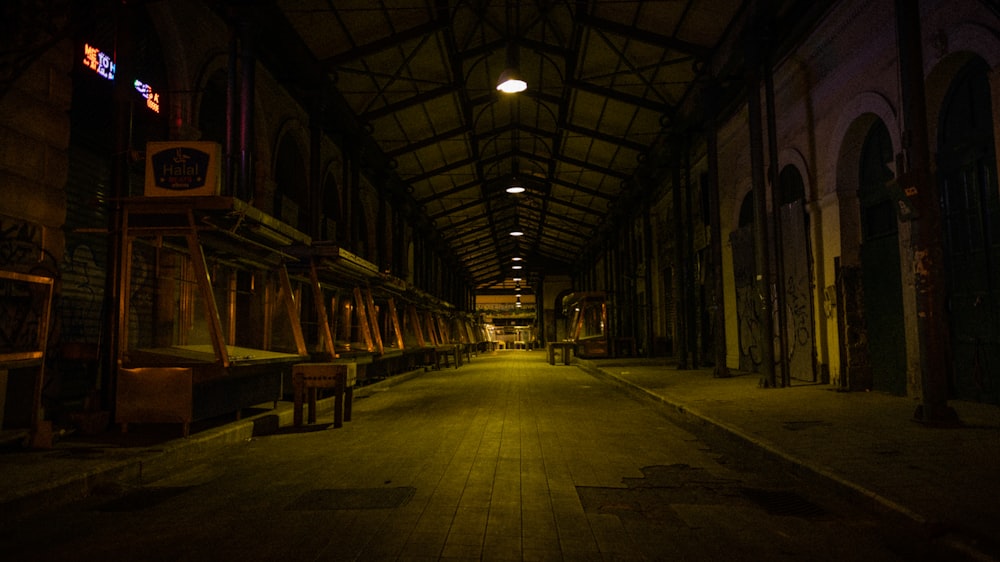 empty hallway with lights turned on during night time