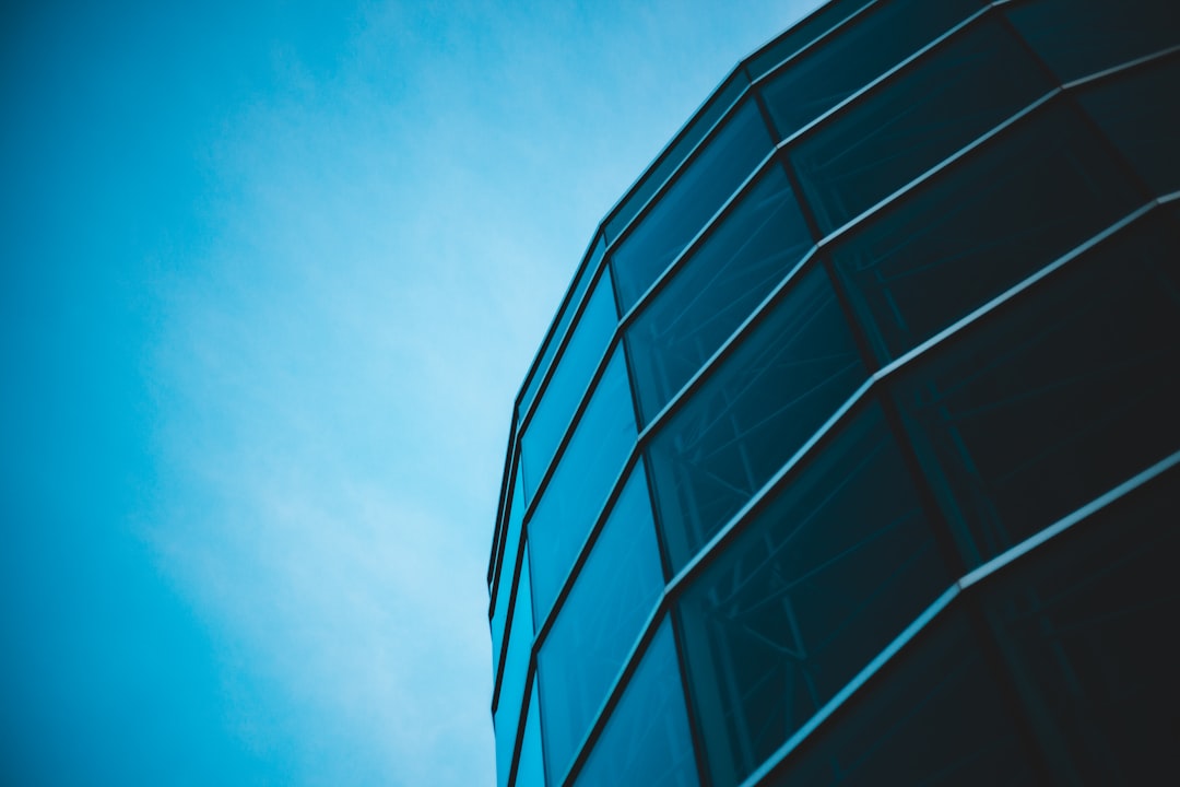 black glass walled high rise building