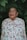 man in white red and blue floral button up shirt