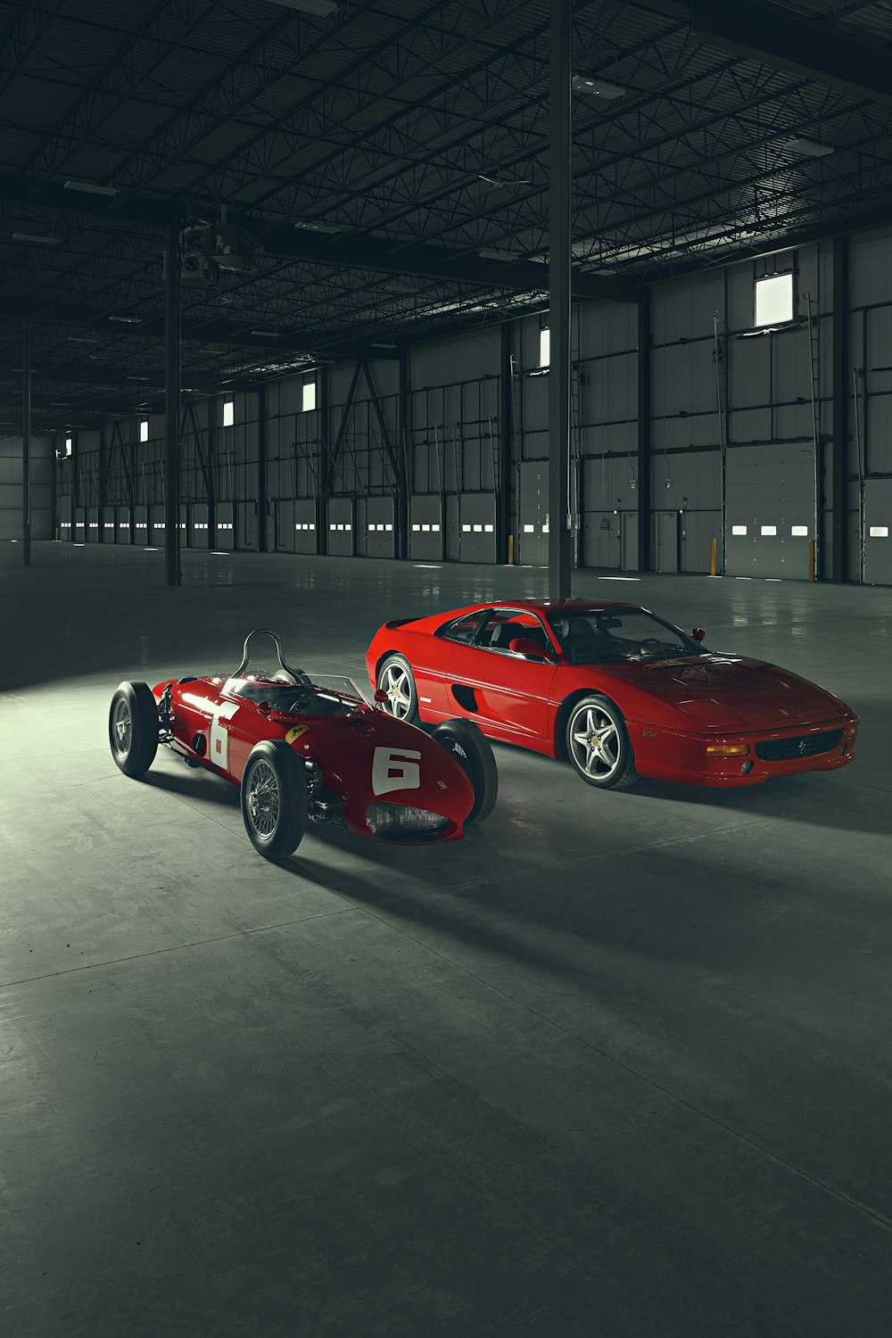 Ferrari 458 Italia rouge garée dans le bâtiment
