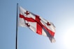 red and white flag on pole