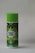 A cylindrical bottle with a bright green cap and label featuring decorative green leaves and a yellow bird. The label reads 'Minyak Herba Sinergi' in white text. The bottle appears to be 100 ml and has a logo with an abstract leaf design.