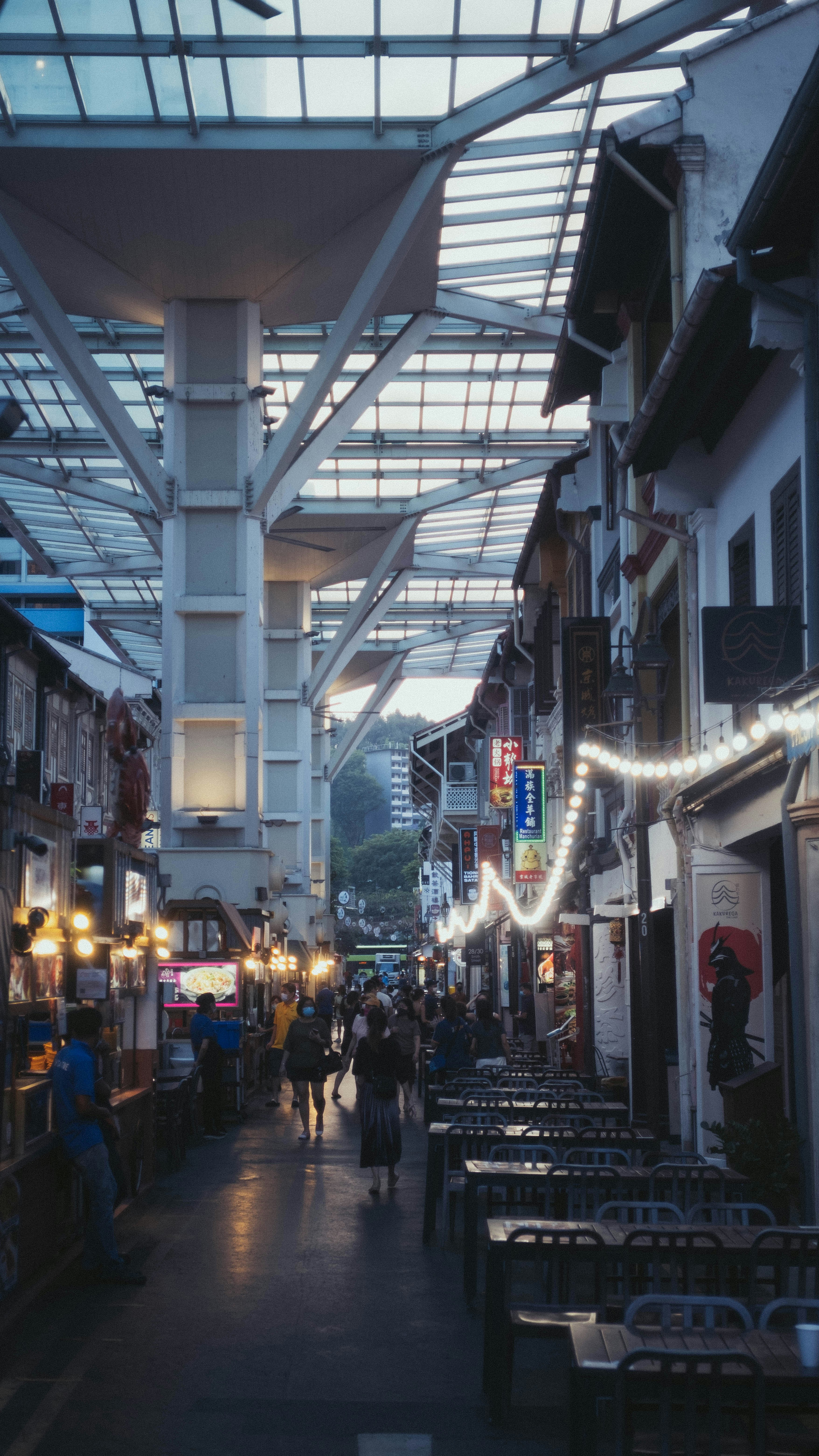 people walking on street during night time