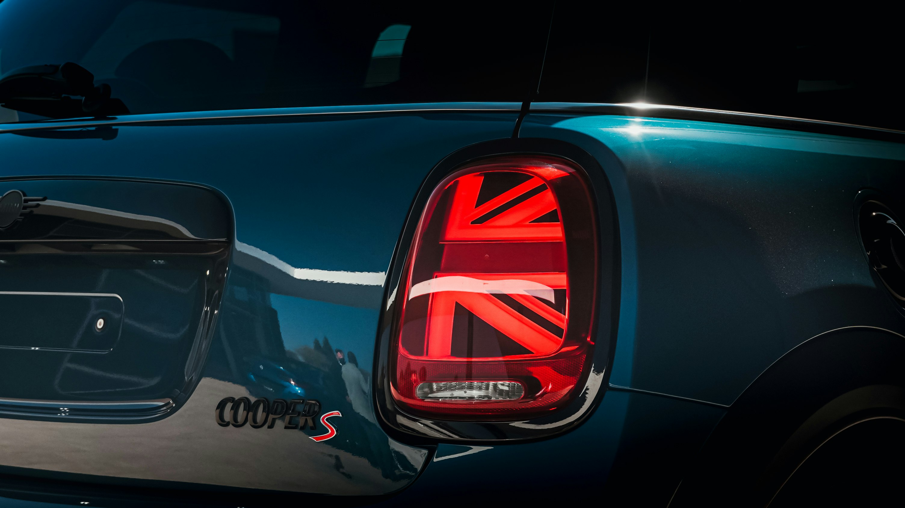 red and black car in close up photography