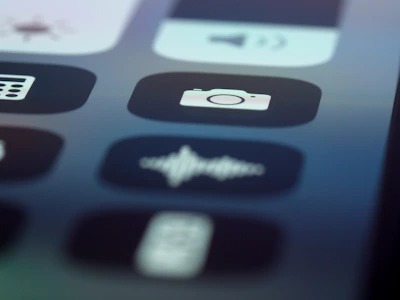 Close-up of an iPhone SE3 displaying the Child of God Phone interface with control settings