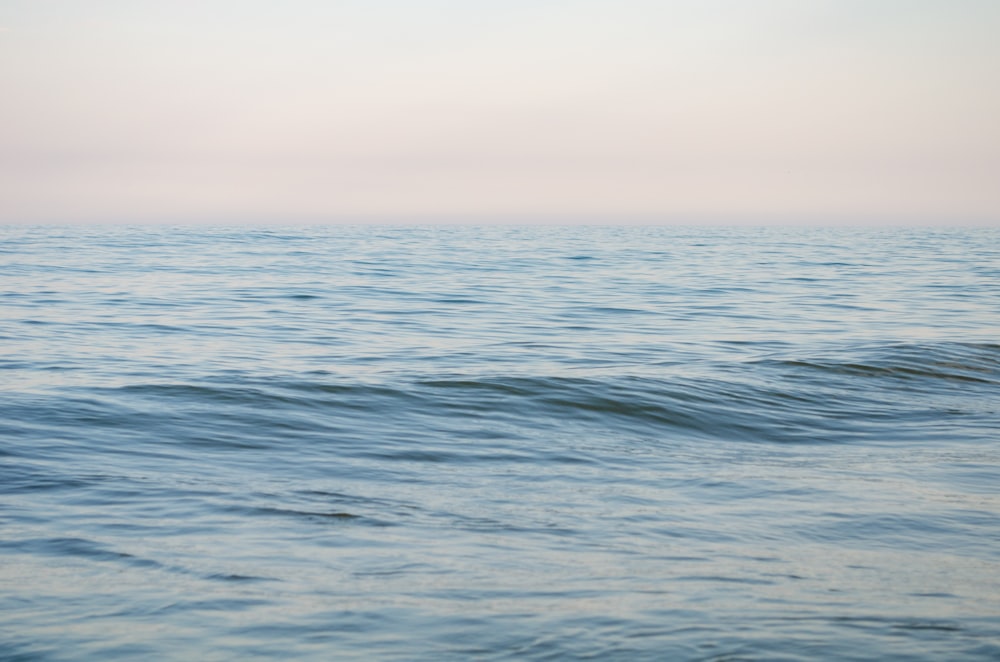 blue sea under white sky during daytime