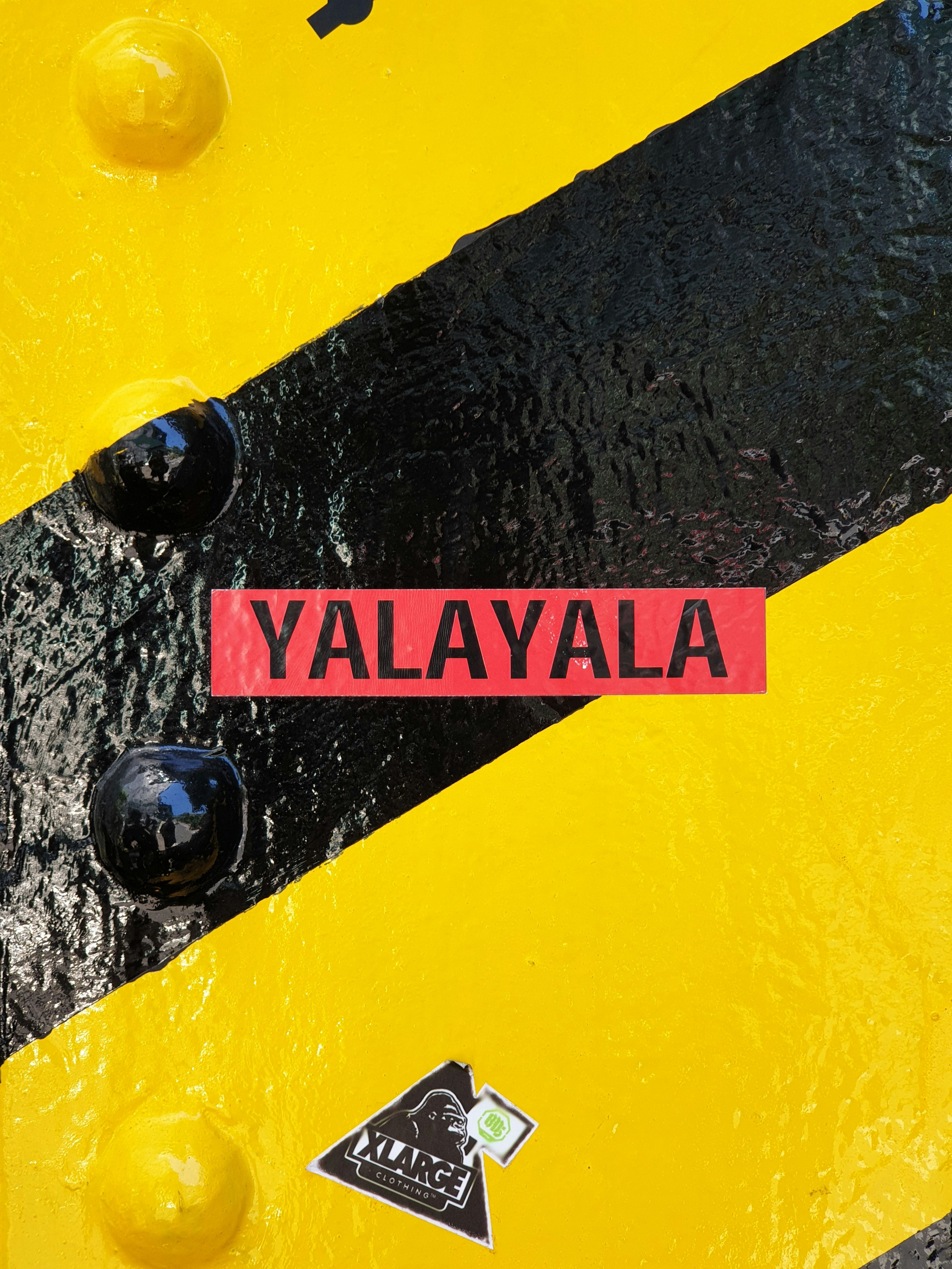 yellow and black caution wet floor sign