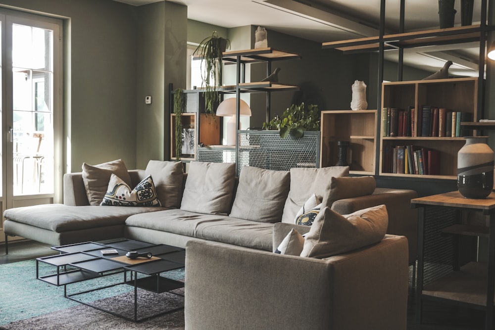 gray couch with throw pillows