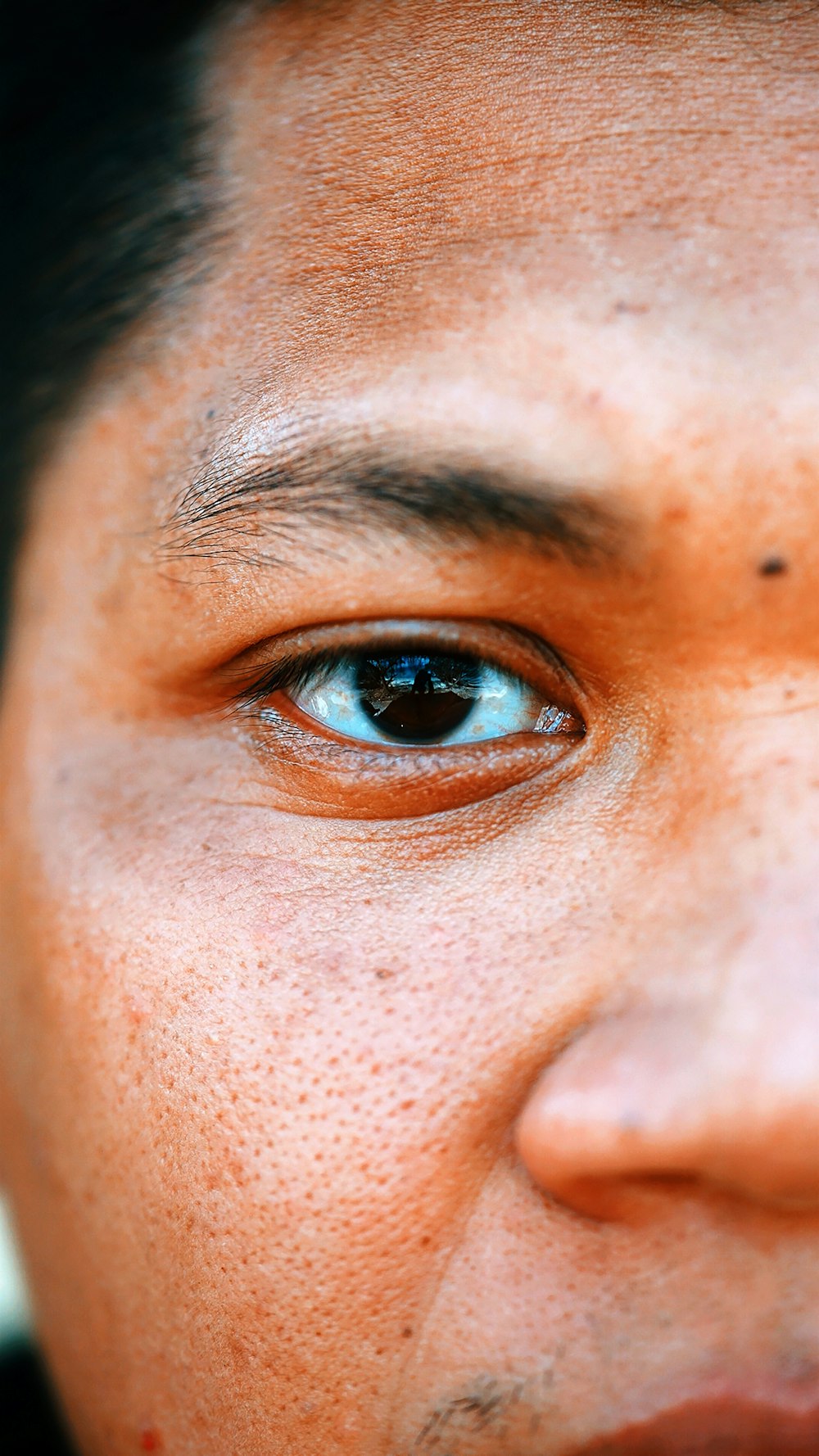 Personas ojos azules en fotografía de primer plano