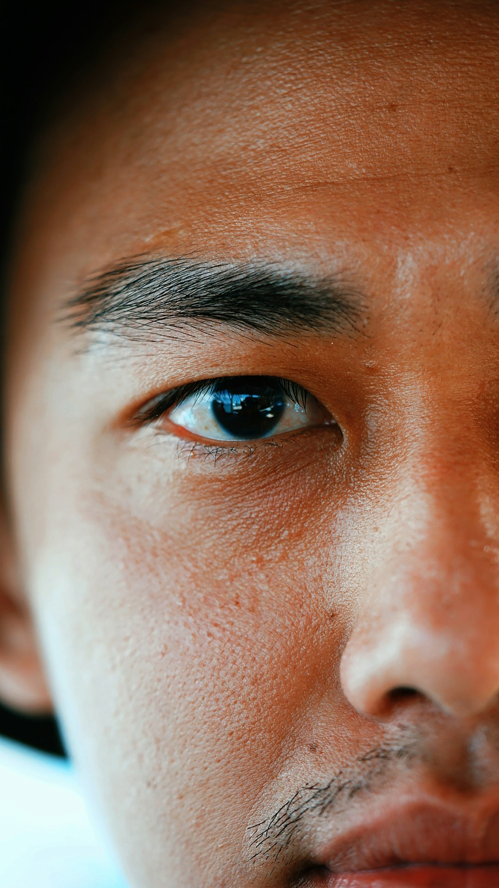 Personas ojos azules en fotografía de primer plano