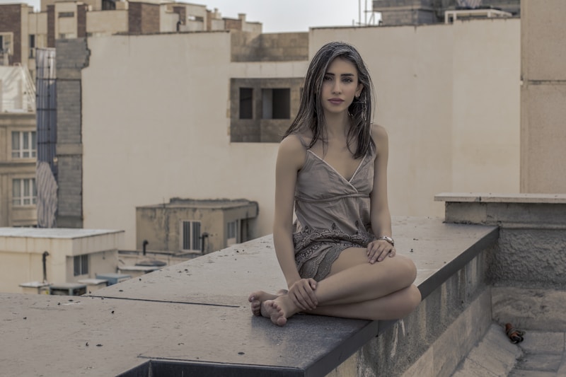 Elegant Greek woman relaxing in city chic